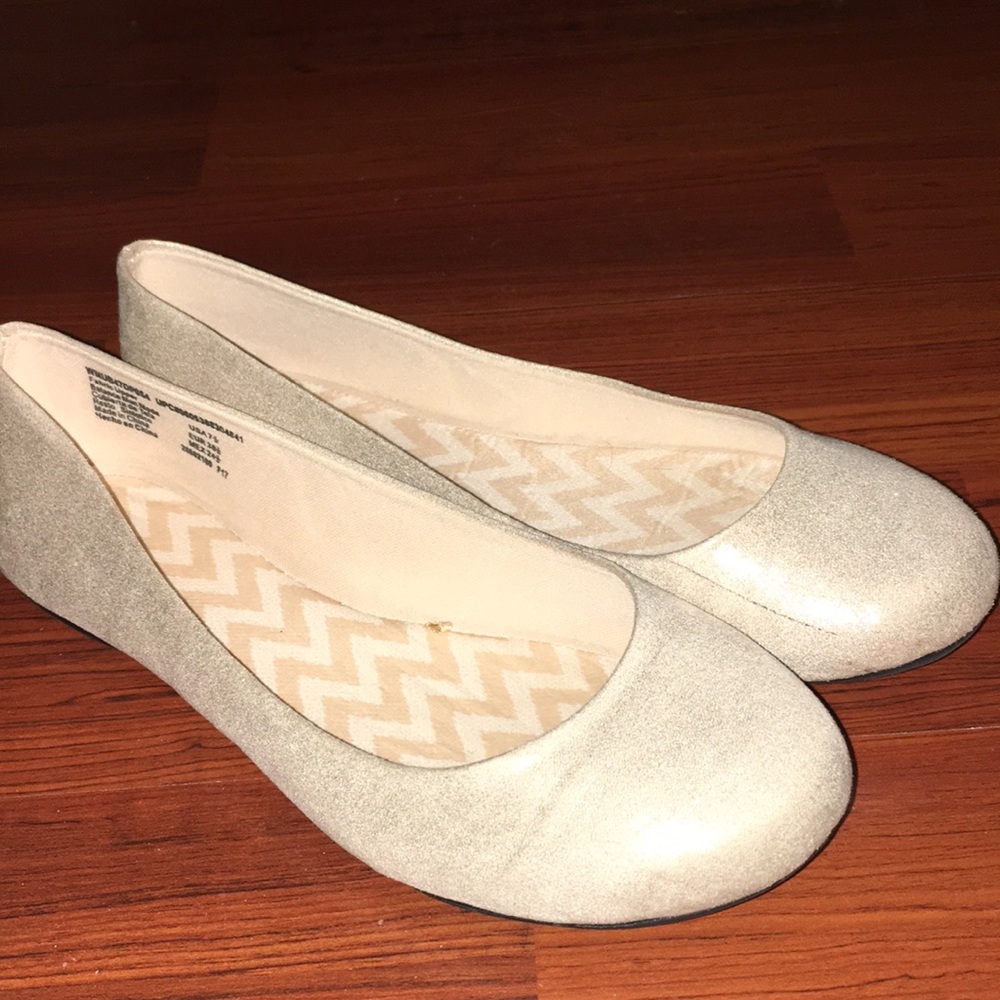 Nude shimmer flats.